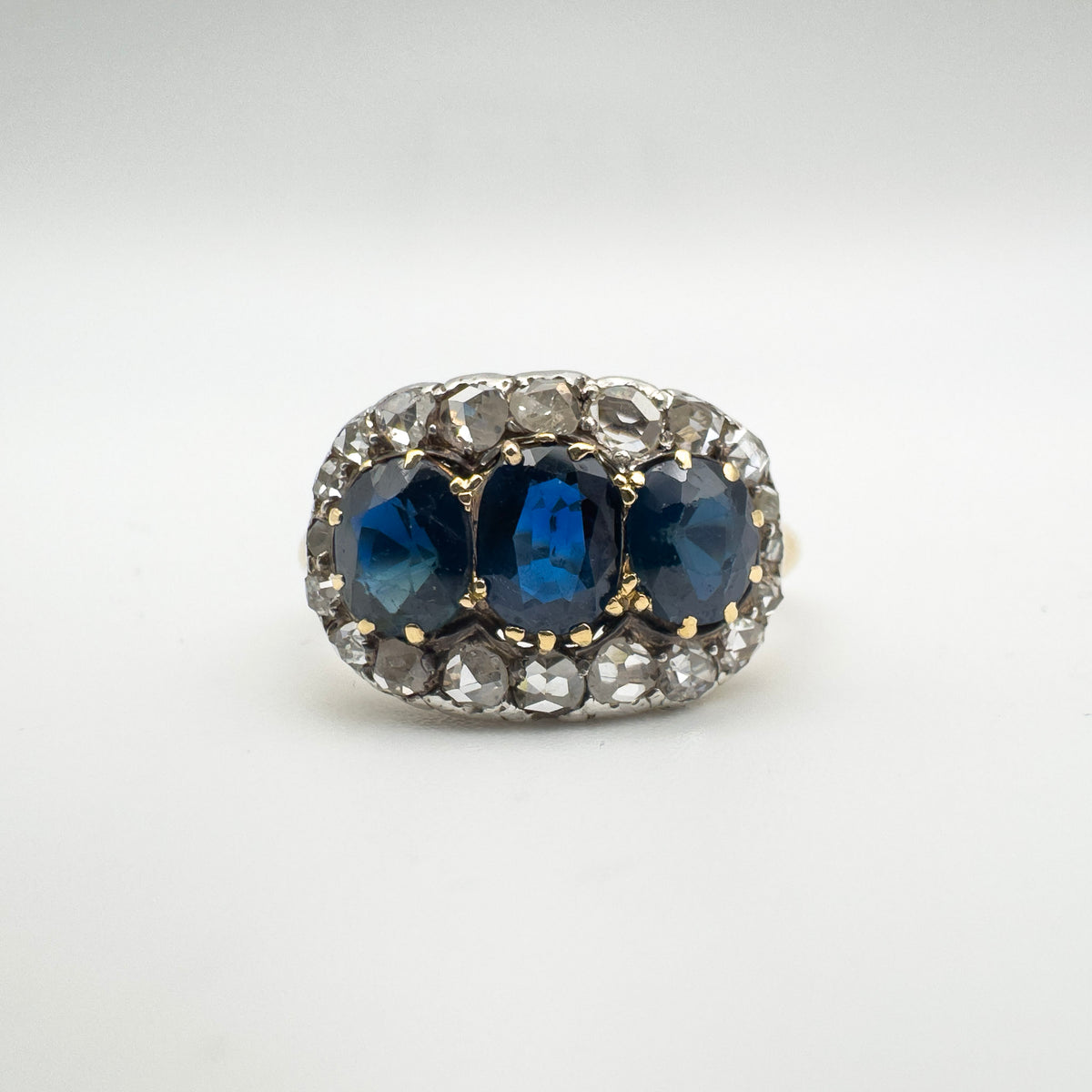 Antique sapphire and rose cut diamond trilogy ring