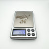 Full diamond necklace and earrings set weighed at 4.3 grams on digital scale
