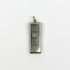 Close up of the front of a chunky sterling silver ingot pendant with Sheffield style hallmark blocks.