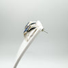Side angle view of chunky sterling silver earrings on display holder