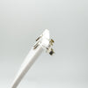 Side view of sterling silver mini horseshoe studs on display stand