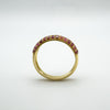 Side view of ruby pavé half hoop band in gold-plated sterling silver