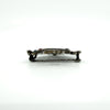 Side profile of giardinetti brooch showing closed pin and hook fitting and overall thickness.