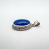 Sterling silver pendant with large blue chalcedony and twisted rope setting