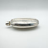 Thick sterling silver photo locket viewed from side showing raised detailing