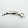 Side view of sterling silver tooth charm with natural diamond and 925 lobster clasp