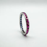 Ruby side of vintage white gold full eternity ring with calibre cut stones