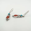 Side angle of sterling silver coral and turquoise cabochon drop earrings