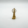 Side view showing three-dimensional design of 9ct gold tower charm