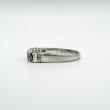 Side view showing 925 stamp on inner band of vintage sapphire ring