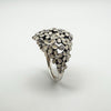 Detailed side of Pandora floral ring with clustered CZs