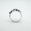 Smooth silver band showing depth of marquise stone settings