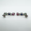 Side view of sterling silver earrings with gemstone claw mount and butterfly backs