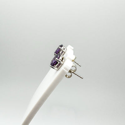 Side angle of sterling silver amethyst earrings showing earring depth