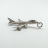 Side profile of the vintage aircraft pendant showing full body and wing detail