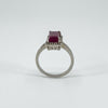 Side profile showing ruby setting height and shoulder diamond accents