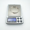 Weighing secondhand sterling silver baby bangle at 4.85g