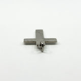 Low angle view of the sterling silver cross pendant showing the bail and thickness.