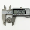 Digital caliper measuring the vintage sterling silver St Christopher pendant at approximately 22.93mm.