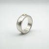 Chunky CZ solitaire ring standing upright showing width and profile
