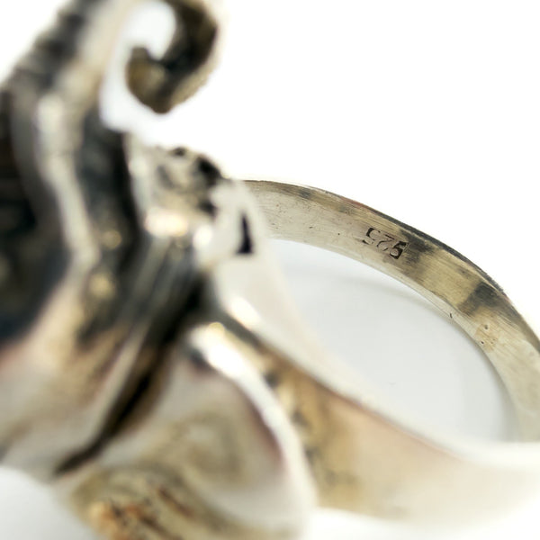 Close-up of the 925 stamp inside the sterling silver elephant locket ring band