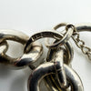 Close up of stamped sterling silver bracelet fitting showing visible 925 hallmark detail.