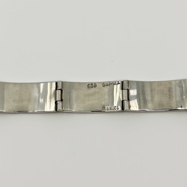Inside of sterling silver turquoise bracelet showing the 925 and Mexico stamps beside the hinged panel