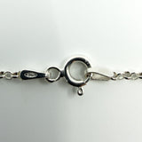 Close up of sterling silver chain clasp stamped 925 with spring ring fastening and fine chain links