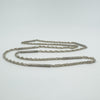 Vintage silver chain with alternating bar and twisted links shown flat