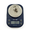 Vintage sterling silver elephant locket ring on digital scales showing approx. 8.85g weight