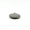 Side view of a vintage sterling silver oval photo locket showing engraved detail and rounded depth