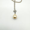 Vintage marcasite and pearl pendant on silver chain with teardrop design