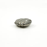 Side view of the sterling silver puffy heart photo locket showing the hinge and rounded shape.