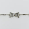 Close up of the sterling silver snaffle link design on the vintage equestrian bracelet.