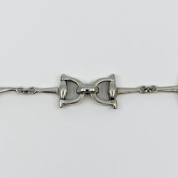 Close up of the sterling silver snaffle link design on the vintage equestrian bracelet.