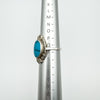 Vintage sterling silver turquoise ring on ring sizer showing size Q-R