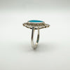 Side profile of turquoise navette ring showing height and detailed setting