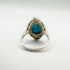 Back view of vintage turquoise marcasite ring with navette silver setting