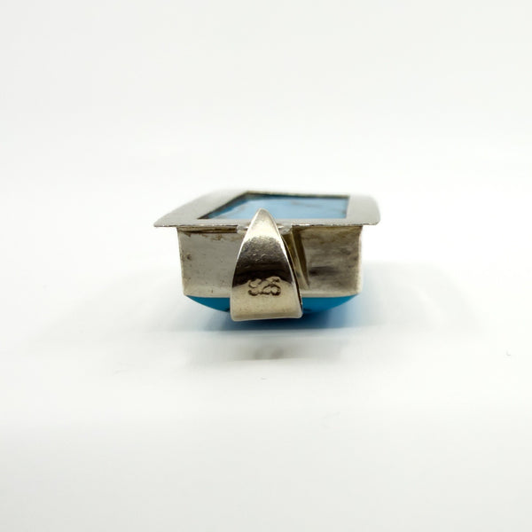 Back view of sterling silver turquoise pendant showing the bail and stamped 925 detail