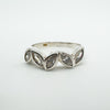Marquise-cut cubic zirconia stones bezel set in a silver half hoop band