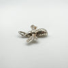 Angled side view of sterling silver bee charm highlighting 3D detail