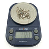 Sterling silver flat curb chain shown on scales, weight displayed as approximately 11.20g.