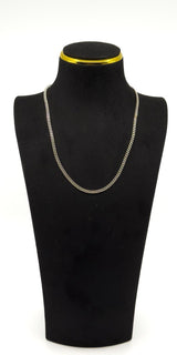 Sterling silver 18 inch flat curb chain shown on a display bust for fit and drop.