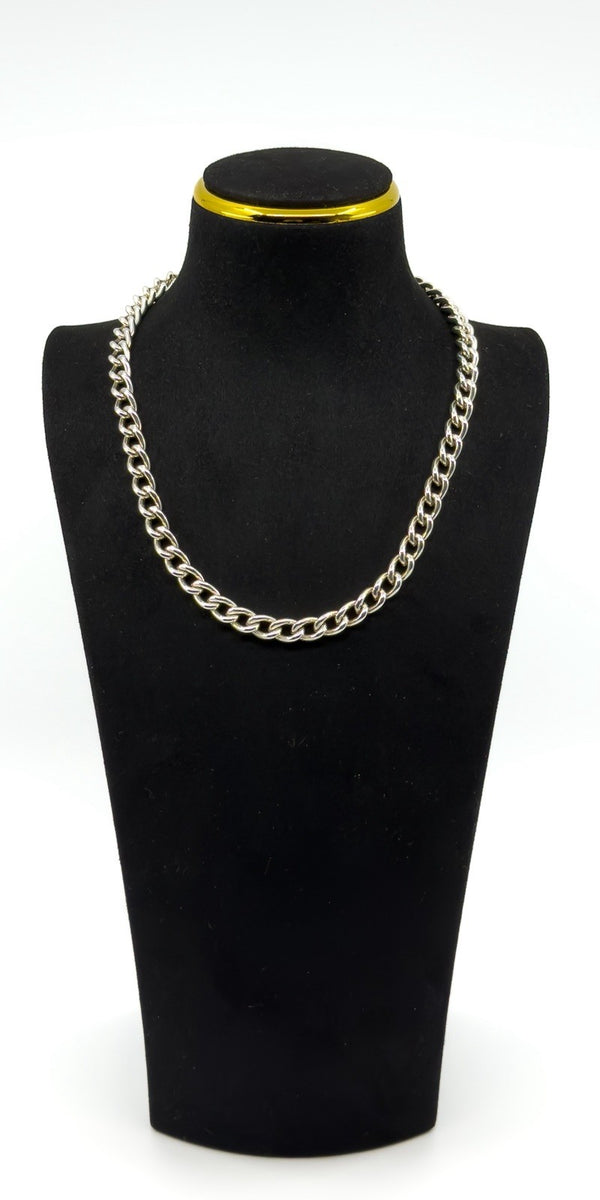 Chunky sterling silver curb chain displayed on black bust, 18 inch necklace length.