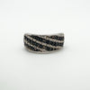 Sterling silver half hoop ring set with cognac and white diamonds