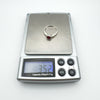 Image showing ruby ring weight as 3.52g on precision jewellery scales