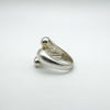 Wrap over design modernist silver ring viewed from the side