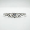 Symmetrical front view highlighting the brilliant-cut CZ in centre setting