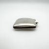Original match striker on bottom of antique sterling silver vesta case
