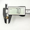 Caliper measuring height of 7mm on vintage lovers knot stud earring